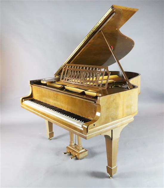 A Steinway & Sons figured walnut boudoir grand piano, W.4ft 8in. L.5ft 10in.